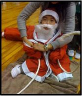 Child dressed as Santa